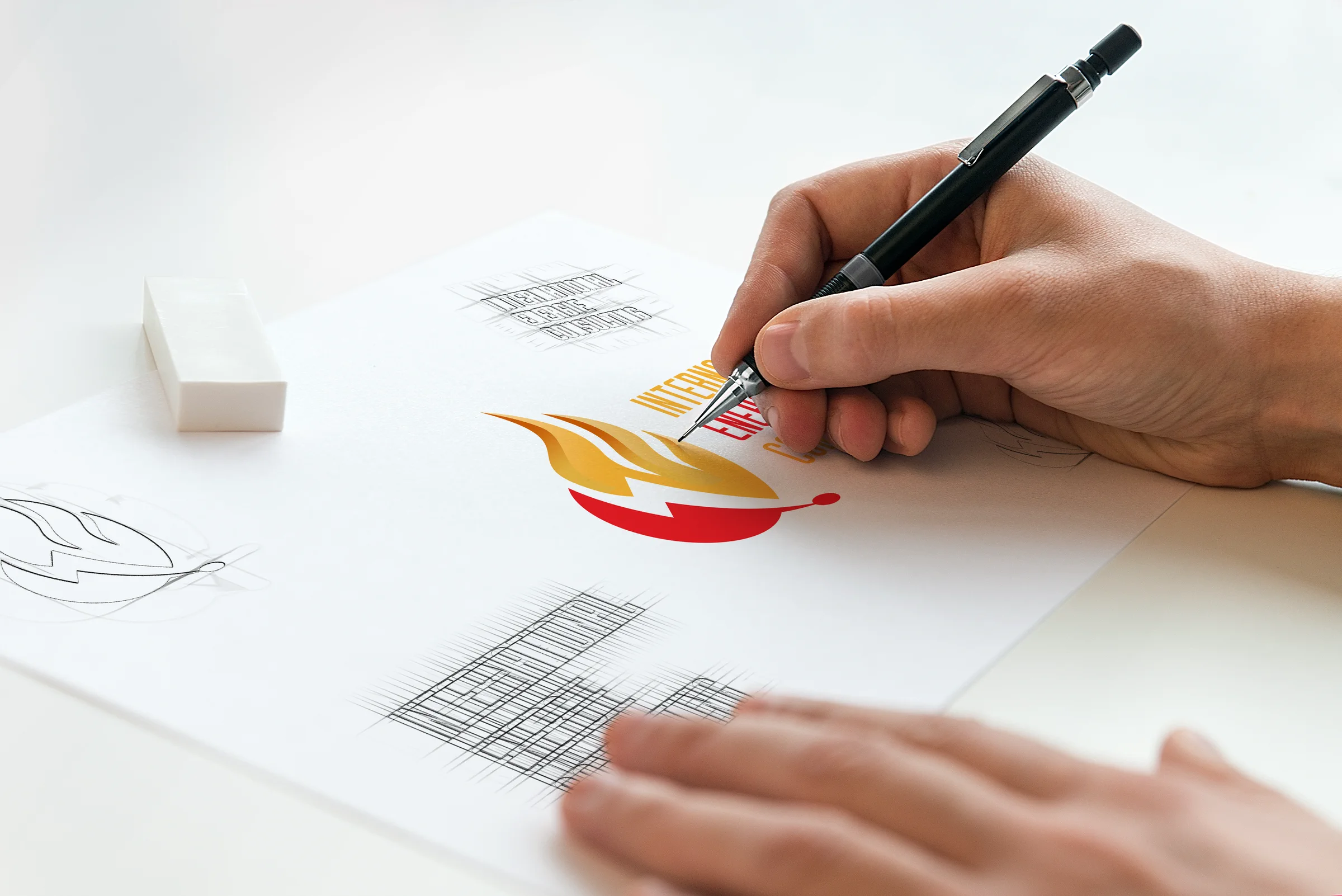 Designer refining an energy consulting symbol
